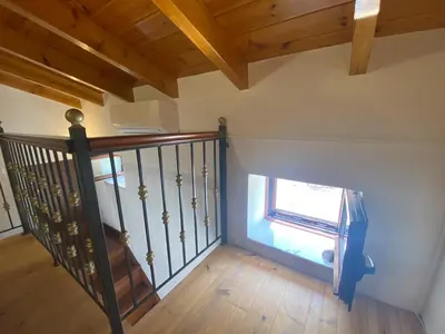 an overhead view of a staircase with a window at Hermes Traditional house in Gialos in Symi