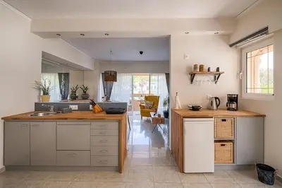 a kitchen with a sink and a counter top at Russelia Suite right in the heart of Rhodes City in Rhodes Town