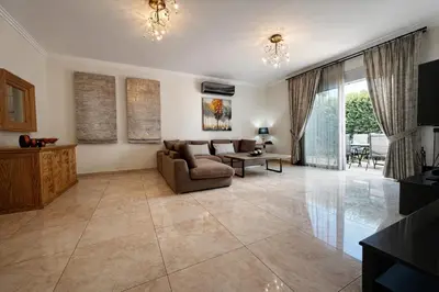 a living room with a couch and a table at Casa Verde Pastida in Pastida