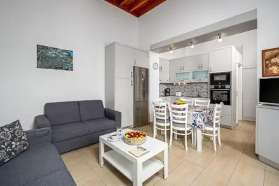 a living room with a couch and a table at Villa Yannis in Líndos