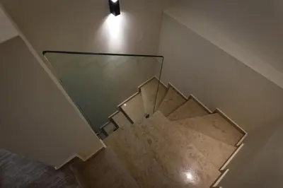 an overhead view of a staircase with a glass ceiling at Unique Icon Residence in Rhodes Town