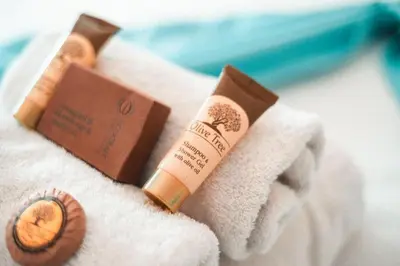 a pair of products sitting on top of a towel at Casa Trees Boutique Hotel in Ixia