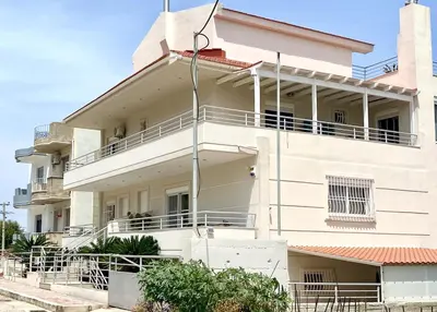 a white building with balconies on the side of it at Andreana s View House Rhodes in Asgourou