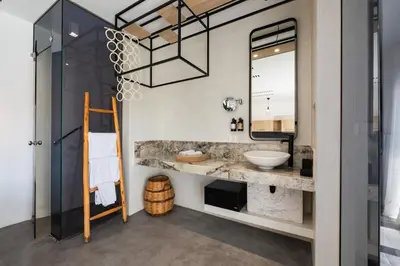 a bathroom with a sink and a mirror at K Studios in Faliraki