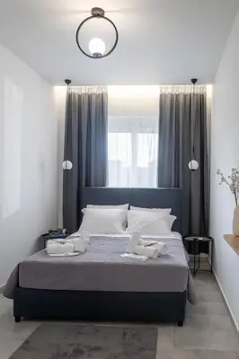 a bedroom with a bed with two towels on it at maison de rivière in Afantou