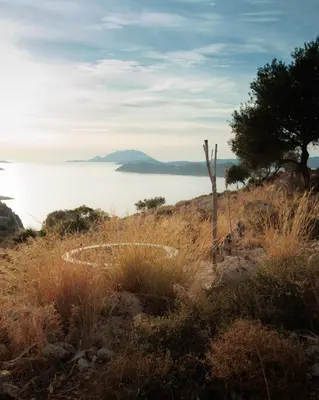 a view of the ocean from the top of a hill at Dawn To Dusk Sea and Mountain View in Kamiros