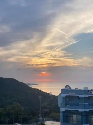 a view of the sunset from a building at Sea View Apartment in Rhodes Town