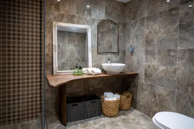 a bathroom with a sink and a mirror at St Nicholas traditional house in Rhodes Town