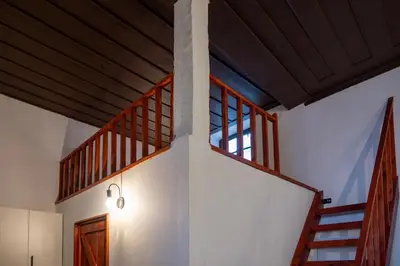a room with a staircase in a house at St Nicholas traditional house in Rhodes Town