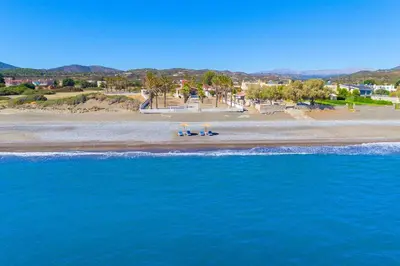 an aerial view of a beach and the ocean at Villa Maria Beachfront Residence in Kiotari
