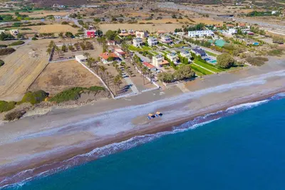 an aerial view of a beach near the ocean at Villa Maria Beachfront Residence in Kiotari