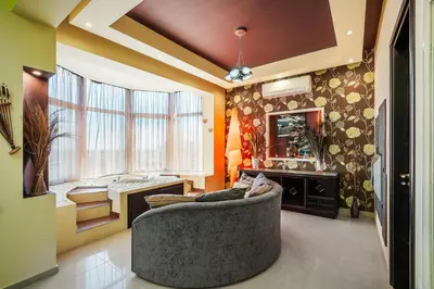a living room with a couch and a sink at Paramithia Villa in Afantou