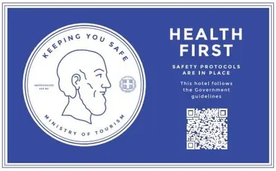 a label with a picture of a head on it at 7Palms in Rhodes Town