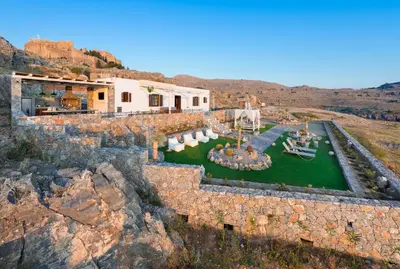 an aerial view of a house on a mountain at Lindos Vigli Private Villa in Líndos