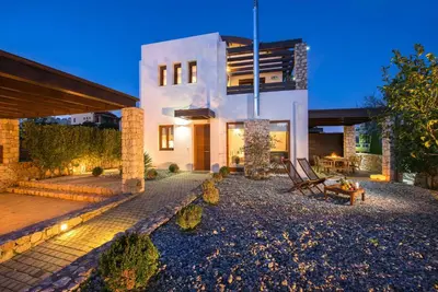 a house with a patio in front of it at Katerina Boutique Villa in Rhodes Town
