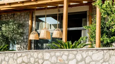 a window of a house with baskets hanging from it at Villa Sealine in Pefki Rhodes