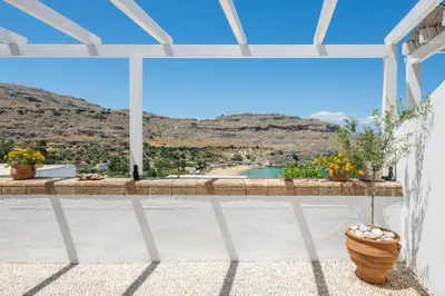 a view from the window of a house at Chrysanthi Studios in Líndos