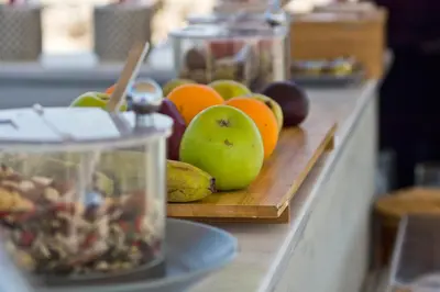 a bunch of fruit sitting on a counter with at Lindos Comfy Suites in Líndos