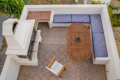 an overhead view of a patio with a wooden door at Villa Dome in Gennadi