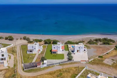 an aerial view of a house next to the ocean at Villa Sevil in Lachania