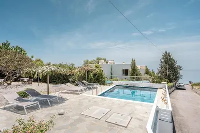 an image of a swimming pool in a villa at Plakia Beach Apartments in Pefki Rhodes