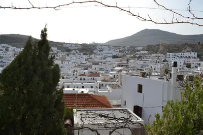 a view of a city from the top of a building at CasaLindos Spitaki in Líndos