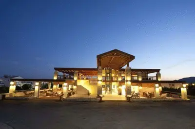 a large building with lights in front of it at Island Blue Hotel in Pefki Rhodes