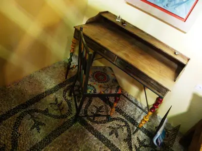 an overhead view of a table and a chair at Villa dei Ciottoli in Rhodes Town