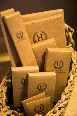 a pile of cardboard boxes in a basket at Villa dei Ciottoli in Rhodes Town