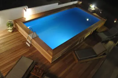an overhead view of a swimming pool on a wooden floor at Villa Imerti Kiotari in Kiotari