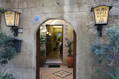 an entrance to a building with an archway at Sofia Pension in Rhodes Town