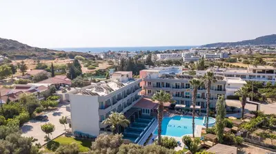 an aerial view of a resort with a pool at Dias Studios & Suites in Faliraki