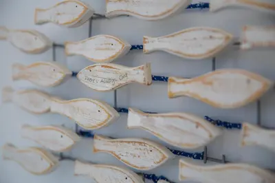 a group of wooden spoons hanging on a wall at Pontoria Stegna Studios in Archangelos