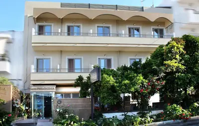 a building with a balcony on top of it at Philoxenia Hotel & Studios in Rhodes Town