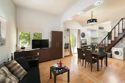 a living room with a couch and a table at Amazing apartment 300 meters from the Old Town in Rhodes Town