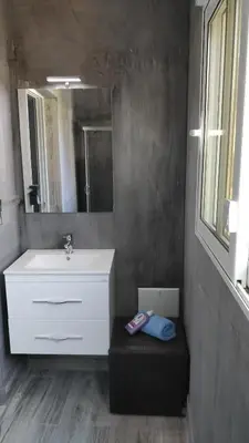 a bathroom with a sink and a mirror at Amazing apartment 300 meters from the Old Town in Rhodes Town