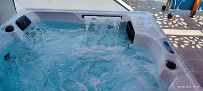 a hot tub with water coming out of it at Villa Elia in Kolimbia