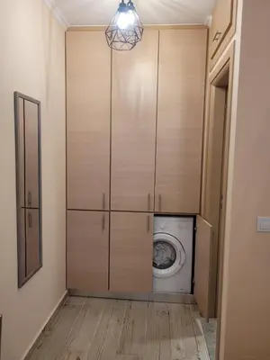 a laundry room with a washer and dryer at Kleanthi and Kostas Studios in Symi