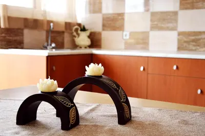 a pair of black glasses sitting on top of a kitchen counter at Sky-Line Apartments in Afantou