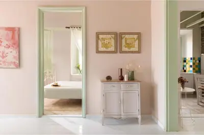 a bathroom with a white tub and a mirror at Aerino in Symi