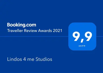 a blue box with the words traveler review awards at Lindos 4 me Apartment in Líndos