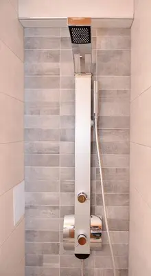 a bathroom with a stairwell with a shower at Island Dreams Rooms & Suites in Rhodes Town