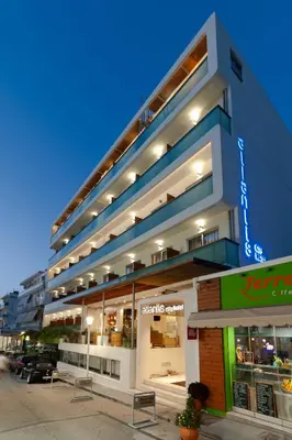 a building with a store in front of it at Atlantis Boutique City Hotel in Rhodes Town