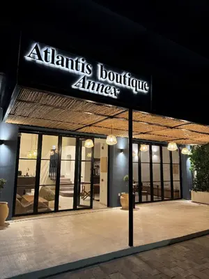 a building with a sign that readsauts boutique alliance at Atlantis Boutique City Hotel in Rhodes Town