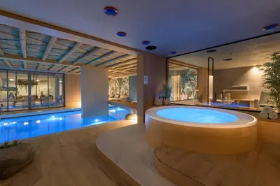 a large bathroom with a large tub in the middle at Porto Angeli in Archangelos