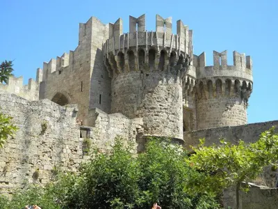 a large castle with turrets on the side of it at Suite Grand Maitre Rodos in Rhodes Town