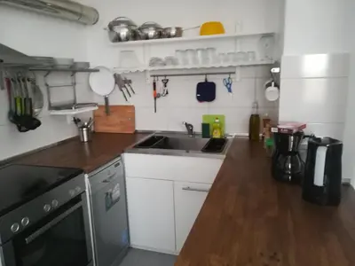 a kitchen with a sink and a counter top at Sea Breeze Villas in Lachania