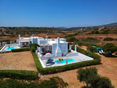 an aerial view of a villa with a swimming pool at Sea Breeze Villas in Lachania