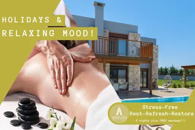 a woman receiving a massage in front of a house at Sperveri Enalio Villas - Heated Pool in Kolimbia