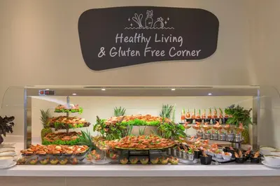 a display case in a store with fruits and vegetables at Sun Beach Resort in Ialyssos